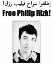 Free Philip Rizk banner